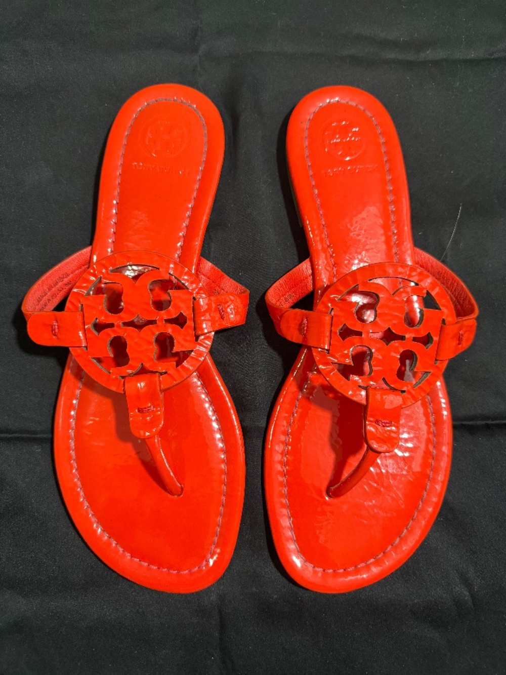 Classic Tory Burch Red Patent Miller Thong Sandals in glossy red patent leather